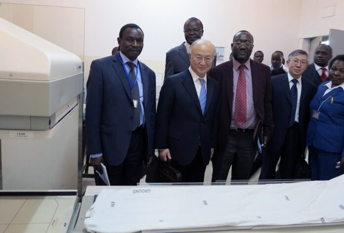 IAEA Director General Yukiya Amano visiting the cancer unit at Kenyatta National Hospital during his official visit to K