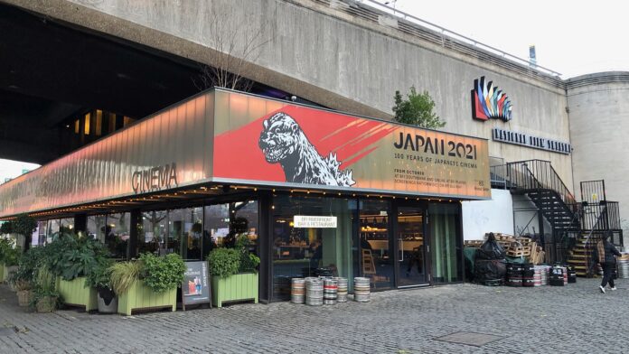 BFI Southbank restaurant below the Waterloo Bridge with marquee advertising its Japan 2021 exhibition in December 2021.